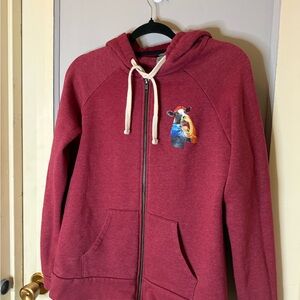 Hogs and Heifers Saloon Next Level Apparel Maroon Hoodie with Bear Design